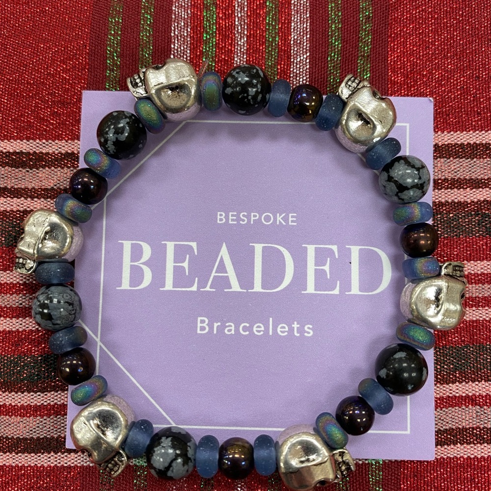 Custom made snowflake obsidian skull stretch bracelet